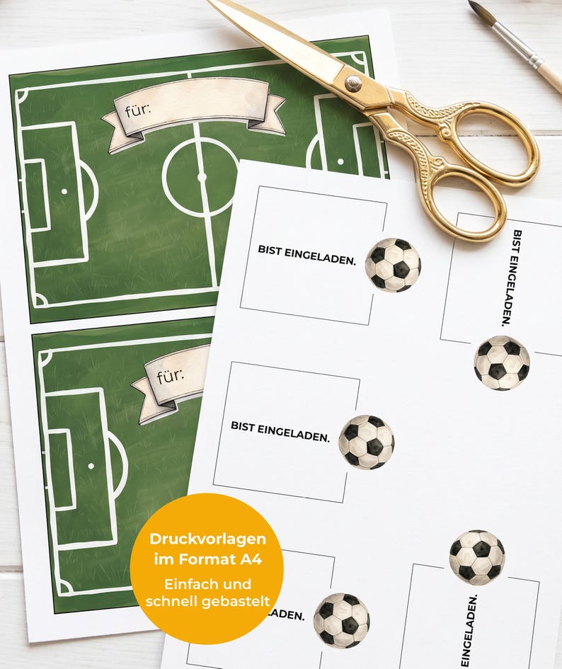 May include: Printed sheets with soccer field designs and soccer ball stickers. The sheets include the text "f&uuml;r:" and "BIST EINGELADEN." A pair of gold scissors and a paintbrush are also visible.