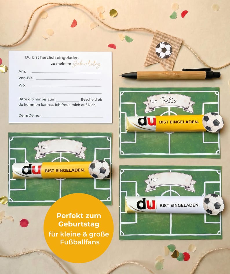May include: A set of soccer-themed birthday party invitations and decorations. The invitations are designed to look like a soccer field, with a chocolate bar that says "BIST EINGELADEN" and a soccer ball. Includes a pen and a banner.