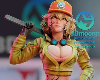 May include: A 3D printed figurine of a woman with blonde hair wearing a yellow jacket, blue shorts, and a baseball cap. She is holding a weapon and has a determined expression on her face. The text "3Dmoonn june reward available on my patreon" is visible in the image.