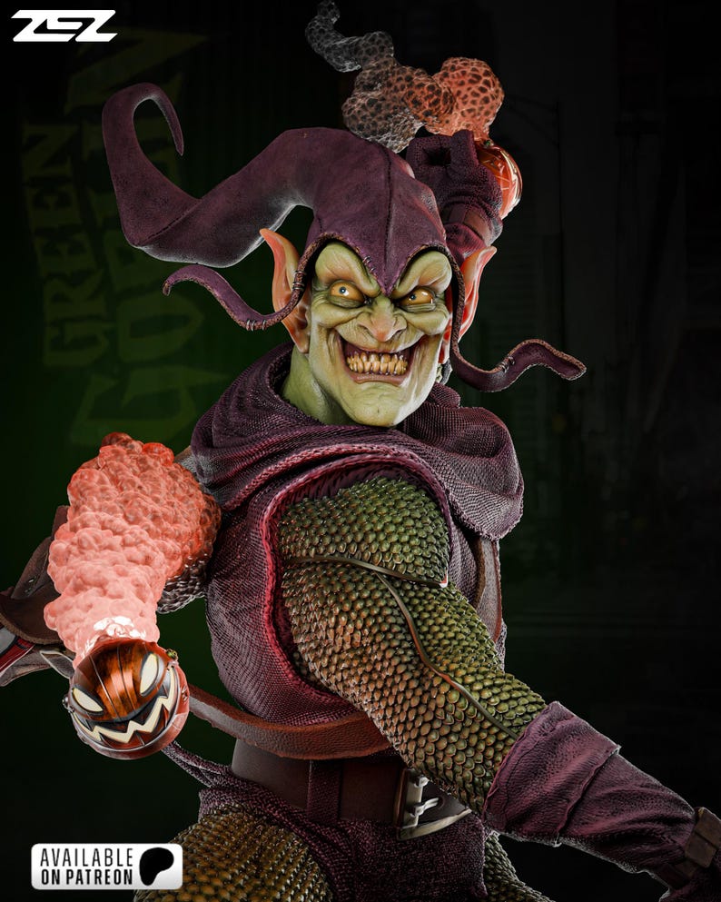 May include: Green Goblin action figure with a purple and green costume, holding a pumpkin bomb. The figure has a green face with a wide grin and pointy ears.