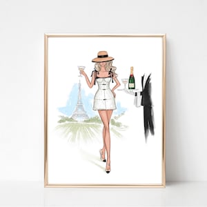 May include: A woman in a white dress and a straw hat stands in front of the Eiffel Tower, holding a glass of champagne. A waiter in a black suit holds a tray with a bottle of champagne and a glass.