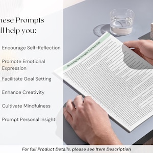 May include: A person holding a journal with the title "Discovering Your Strengths: Your Inner Gifts." The journal is open, revealing lined pages of text. Text on the left side lists prompts to encourage self-reflection, promote emotional expression, and facilitate goal setting.