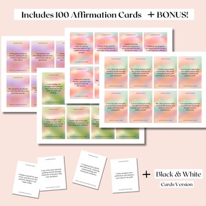 May include: A set of 100 affirmation cards with colourful backgrounds and inspirational quotes. Includes a bonus black and white version of the cards.  "Includes 100 Affirmation Cards + BONUS!" and "Black & White Cards Version" are printed on the image.