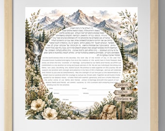 May include: A framed wedding ketubah featuring a mountain landscape with a waterfall, pine trees, and wildflowers. The center contains Hebrew and English text, with signature lines for bride, groom, witnesses, and officiant. A wooden signpost reads ADVENTURE TOGETHER EVERYWHERE.
