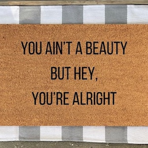 Bruce Springsteen Lyrics Doormat - You ain&#39;t a beauty but hey, you&#39;re alright - Thunder Road, Springsteen gift, home decor