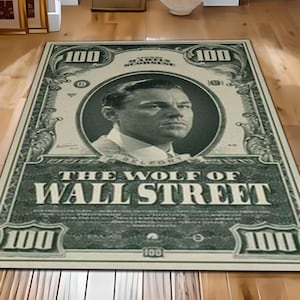 May include: A green and white rug with a design that looks like a $100 bill. The rug features a portrait of Leonardo DiCaprio and the text "The Wolf of Wall Street".