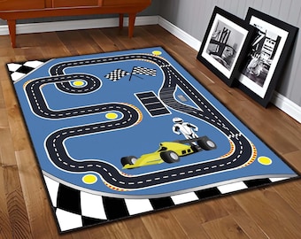 May include: A blue and black race track rug with a yellow race car and a figure of a race car driver. The rug has a checkered border.