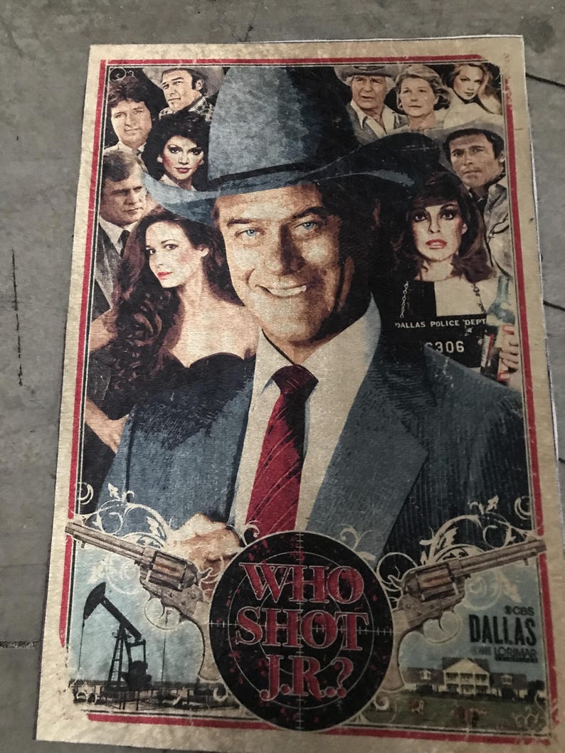 May include: A retro poster with a central image of a man in a hat, with other people around him. The poster includes the text "WHO SHOT JR?" in a circular design, with images of guns and oil derricks. The CBS Dallas logo is also visible.