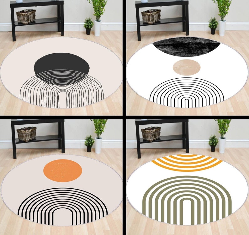 May include: Four round rugs with different geometric designs. The rugs are white with black, brown, orange, and green accents. The designs feature circles, arches, and stripes.