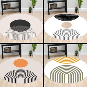 May include: Four round rugs with different geometric designs. The rugs feature a white background with black, brown, orange, and green geometric shapes. The rugs are perfect for adding a modern touch to any room.