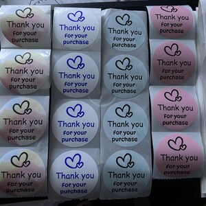 100 pegatinas redondas de 2 pulgadas con la frase "Gracias por su compra". 6 colores. Se pueden personalizar.