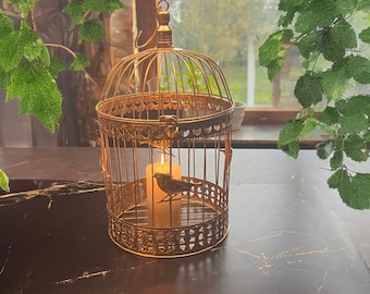 Golden decorative birdcage for candles, money gifts, wedding decorations