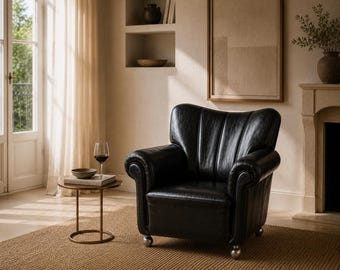 Art Deco Style - Black Leather Club Chair from the 1950s, on Casters with Riveted Back, Exceptional Quality Craftsmanship