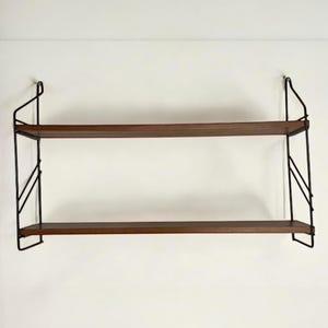 Small mid-century String shelf with two shelves. Original 1960s String/Ladder shelf in the style of WHB, Nissen, and Co.