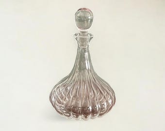 Antique baluster decanter. Art Nouveau decanter with a solid crystal stopper, made between 1900 and 1920.