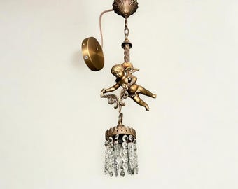 Lámpara Art Nouveau original con un querubín volador, de bronce y cristal, circa 1915. Lámpara vintage de bronce con forma de ángel.