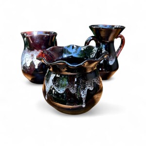 Vintage ceramic set consisting of a vase, pitcher, and amphora in a typical 1970s look