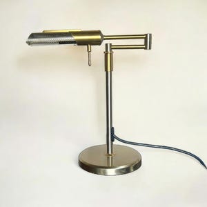 N-Licht table lamp with item number 5447. Top-quality craftsmanship from Germany. Continuously dimmable, swiveling, and extendable.