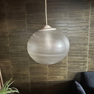 Original Peill Putzler pendant lamp from the 1970s with a large, beautifully grained glass globe.