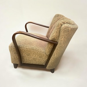Art Deco bentwood armchair - circa 1940s German cocktail chair with bentwood armrests and green brocade upholstery.