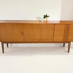 Mid-century walnut sideboard - Scandinavian design from the mid-1960s, made in Germany.
