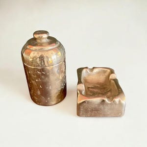 Mid-century smoking set made of heavy brass, consisting of an ashtray and cigarette case, hallmarked, 1960s
