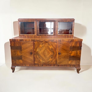 Art Deco sideboard, buffet - Germany, circa 1920s-30s. Root wood veneer with a glass display case and pull-out marble countertop.