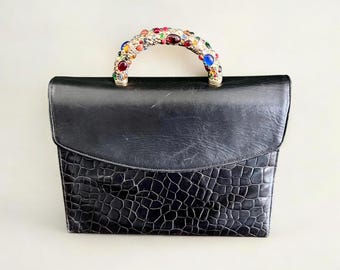 Rare leather handbag by Oreste Fiorini from the 1990s with a decorative handle, black evening bag