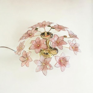 Mid-century ceiling lamp made of Murano glass flowers. Made in Italy.