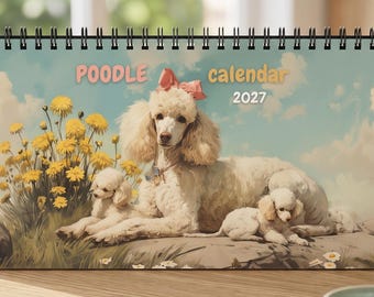 May include: A spiral-bound desk calendar titled Poodle calendar 2027, featuring an illustration of a large white poodle with a pink bow and two small poodle puppies resting on a rock near yellow wildflowers against a blue sky with clouds.