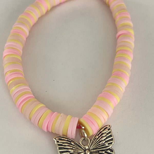 Pink and yellow clay bead bracket with butterfly charm