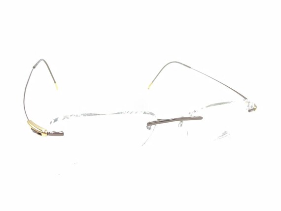 Silhouette Gold & Black Rimless Eye Glasses 5452 20 6051 17 135 Australia 051 Silhouette 5452 20 6051 Gold Black Rimless Eyeglasses Frames  main image 3