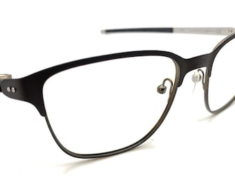Montura de gafas cuadrada de metal Oakley Seller OX3248-0252 en color peltre en polvo, talla 52-18, 140