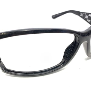 May include: A rustic wooden sign with the text "Welcome to our home" in white lettering. The sign features a distressed finish and a simple, inviting design, perfect for entryway decor.