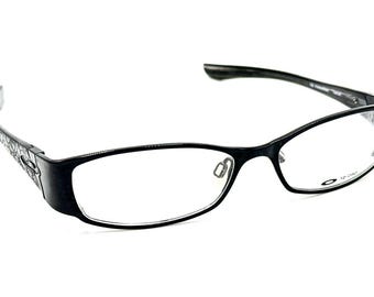 Monturas de gafas de titanio Oakley Coto 4.0 Titanium Polished Black 51-15 130