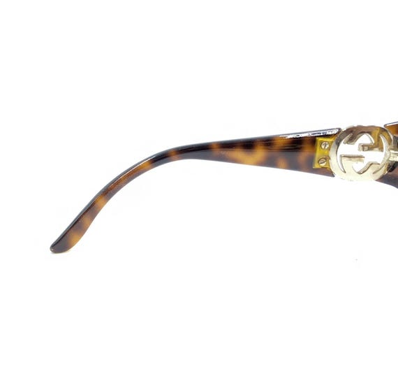 グッチ GG トータスブラウンゴールドオーバルサングラスフレーム 130