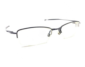 Monturas de gafas de media montura de metal negro pulido Oakley Jackknife 4.0 51-19 138