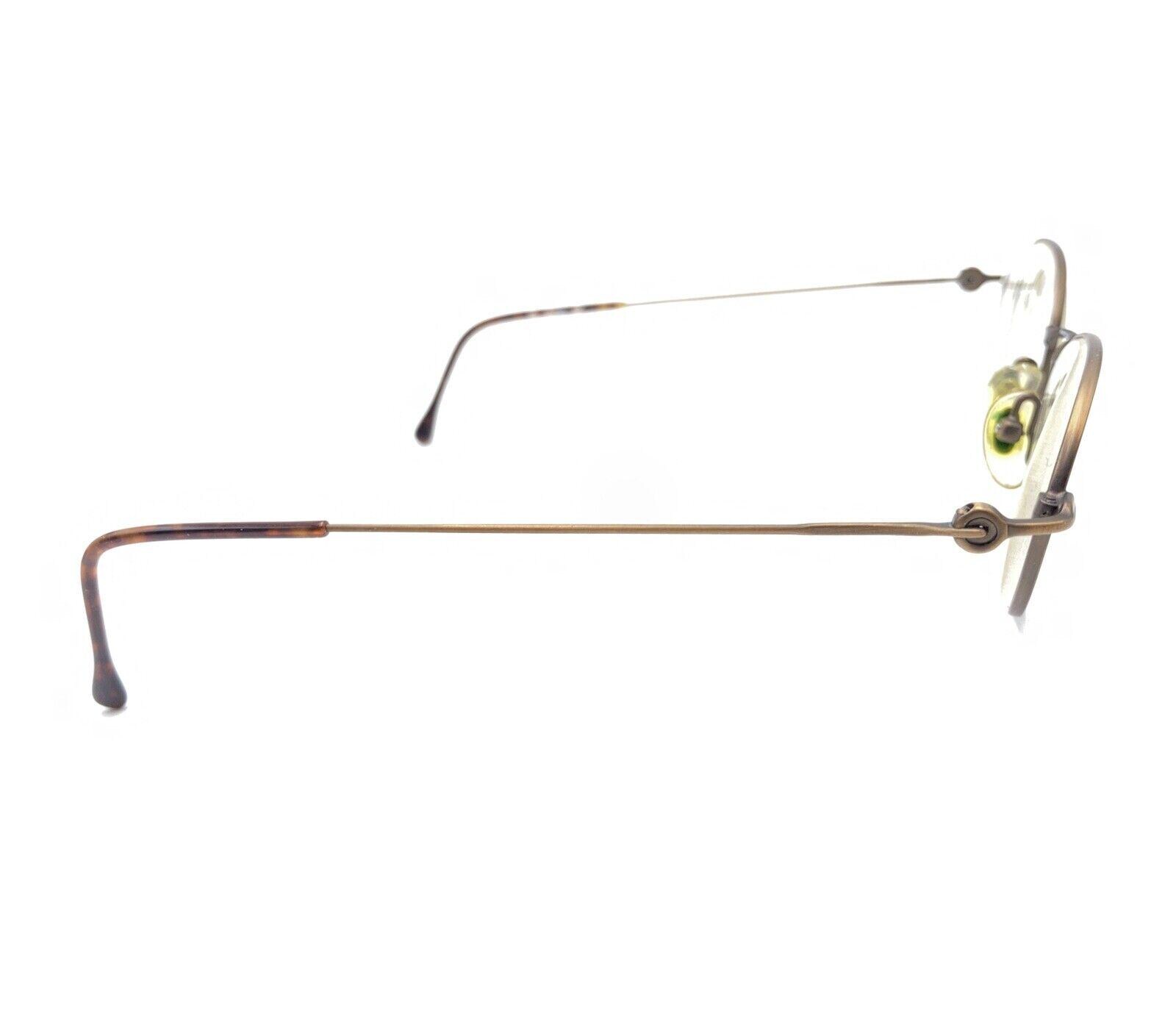 Vintage Gucci GG 2623 Bronze Oval
Sunglasses 140 Gucci Vintage Sunglasses GG 2413/S | sold Color: light brown  main image 3