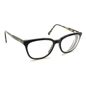 May include: Black-rimmed eyeglasses featuring a glossy finish on the front frames and a brown and black tortoiseshell pattern on the temples. The glasses have clear lenses and a classic rectangular shape with rounded edges for a balanced look.
