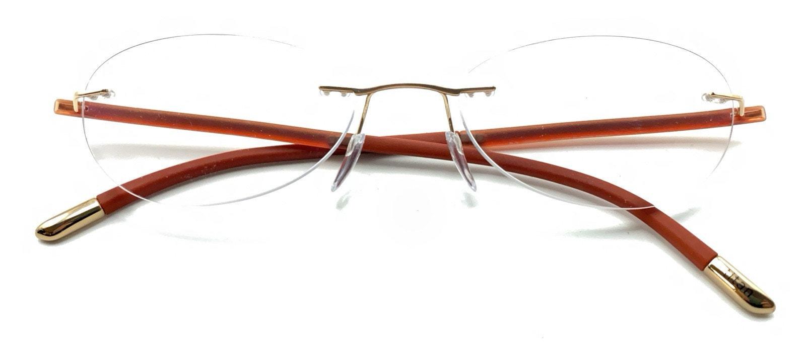 Silhouette Eyeglasses Titan 5479 20 6055 Designer Frames Only Red 17-135 Buy Silhouette 5479 20 6055 Fusion Collection Eyeglasses  main image 4