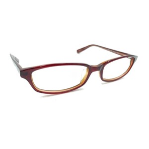May include: Eyeglasses with a rectangular frame featuring a deep burgundy outer rim and a lighter amber-toned inner rim. The temples are thin and match the burgundy color of the frame front, connecting to the lenses with a standard hinge design.