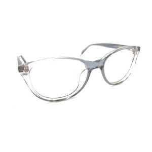 May include: Clear, transparent eyeglasses with a rounded, cat-eye frame shape. The frames are constructed from a smooth, glossy material, featuring thin temples and a bridge that connects the two lenses. The design is simple and functional.