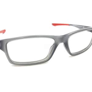 May include: Gray eyeglasses with red accents on the arms. The frame is made of a lightweight plastic material.