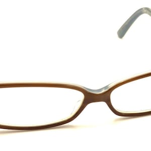 May include: Brown and blue rectangular eyeglasses with a thin frame.
