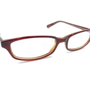 Oliver Peoples Maria SHA Rubinröda Rektangulära Glasögonbågar 49-16 135 Japan