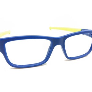 May include: Blue and yellow plastic framed spectacles with clear lenses.