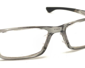 Monturas de gafas Oakley Airdrop OX8065-0253 Clear Grey Shadow 143 Designer