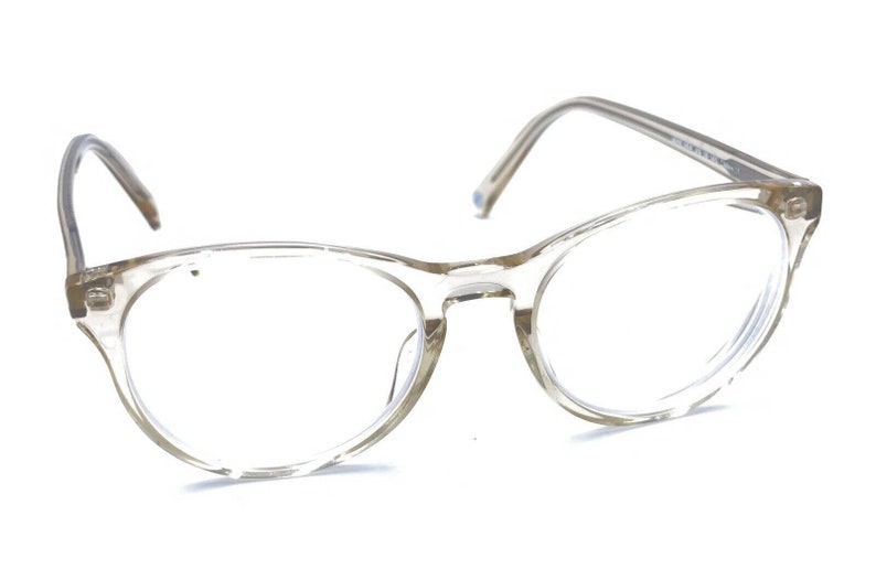 Warby Parker Jane 664 Clear Round Eyeglasses Frames 49-18 145 Designer image 1