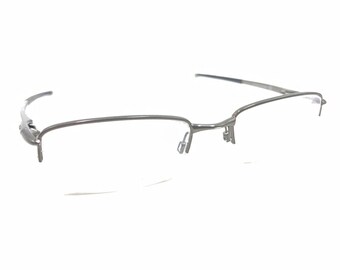 Monturas de anteojos Oakley Rhinochaser OX3111-0152 gris cemento con media montura 52-19 143
