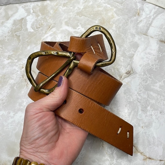 Unique handmade and hand tooled leather belt